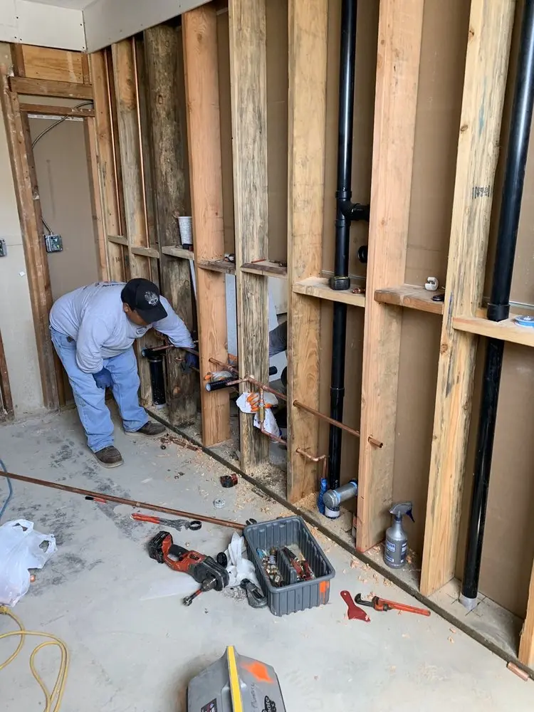 Commercial rough-in plumbing for Water Heater Replacement in Bloomfield